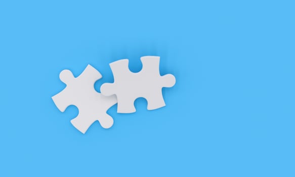 Two white jigsaw pieces photo
