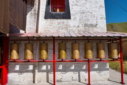 Prayer wheel in Arou Da Temple in Qinghai China. photo