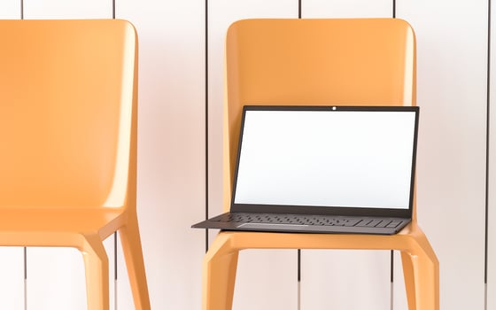 The laptop is used for business communication over the internet. photo