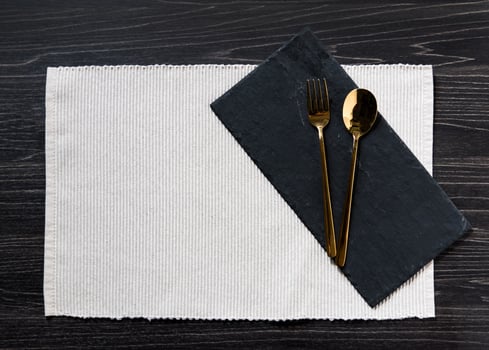 Empty plate with silver fork  and Spoon dining dish, copy space photo