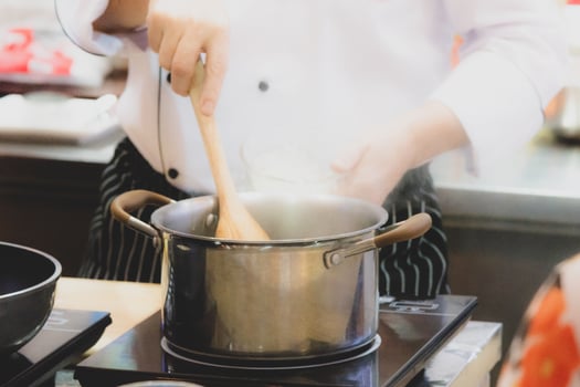 Chef preparing food, meal, in the kitchen, chef cooking photo