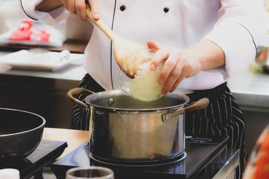 Chef preparing food, meal, in the kitchen, chef cooking photo