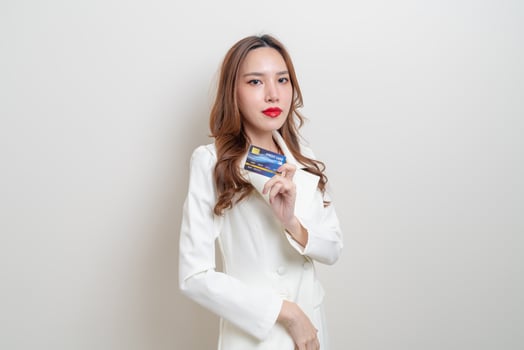 Portrait beautiful Asian woman holding credit card photo