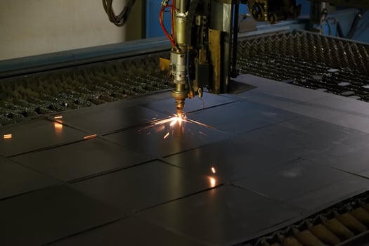 Welding machine connects the square metal parts photo