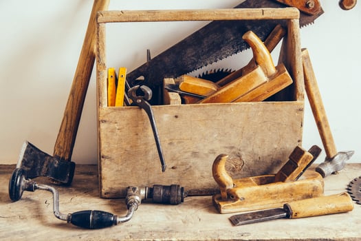 Old Wooden Tool Box Full of Tools. Old carpentry tools. Still life photo
