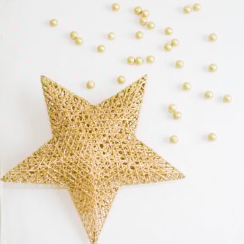 Golden star and small balls as Christmas decoration photo