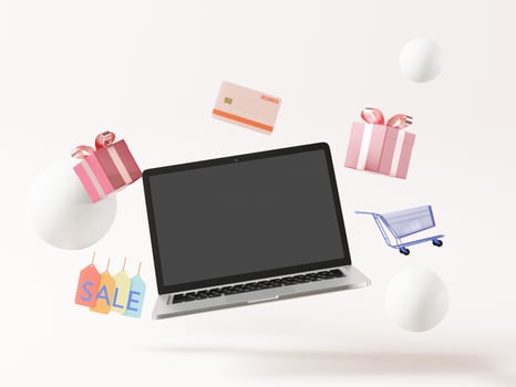 Laptop are located on the floor with a gift shop. photo
