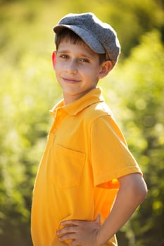 Happy boy in cap photo