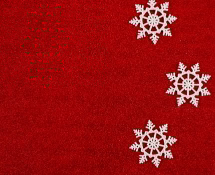 Red Christmas background with snowflakes. photo