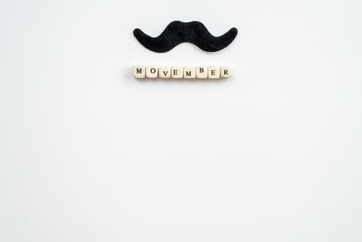 Men's health concept. Moustaches and lettering background. photo