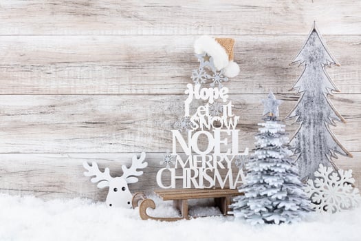 Christmas tree on wooden background. photo