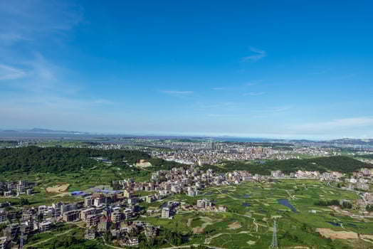 The mountain overlooks the rich villages and towns photo