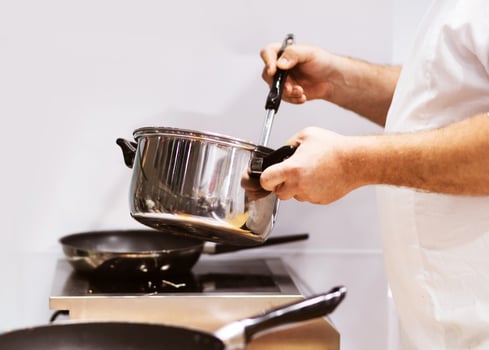 Chef cooking food in the kitchen, Chef preparing food photo