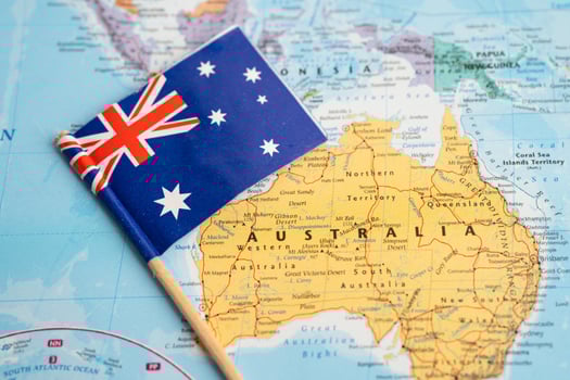 Australia flag on world map background. photo