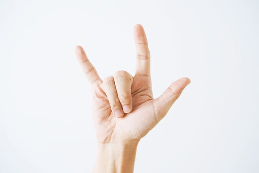 Love hand sign on white background photo