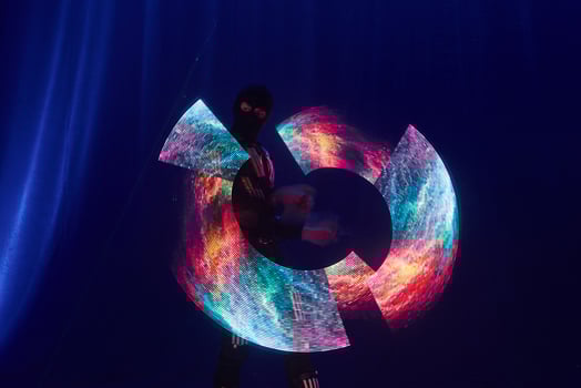 Laser show performance, dancers in led suits with LED lamp, very beautiful night club performance, party photo
