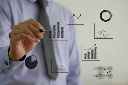 business chart and graph. Businessman touching virtual screen hologram. photo