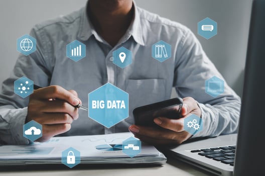 businessman holding pen and smartphone icon big data virtual screen. Business technology concept, Business Marketing, Investment and Data Analytics. photo