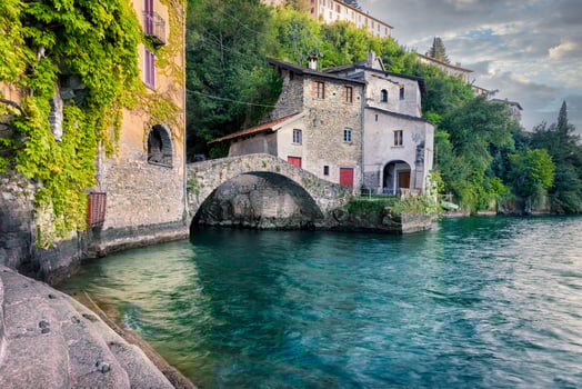Old little village with a beautiful stone bridge along Lake Como photo