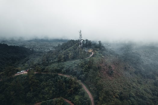 Mountains and green trees during the day photo