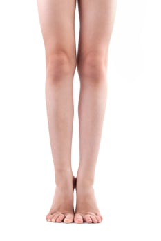 Two human legs standing on tiptoe photo