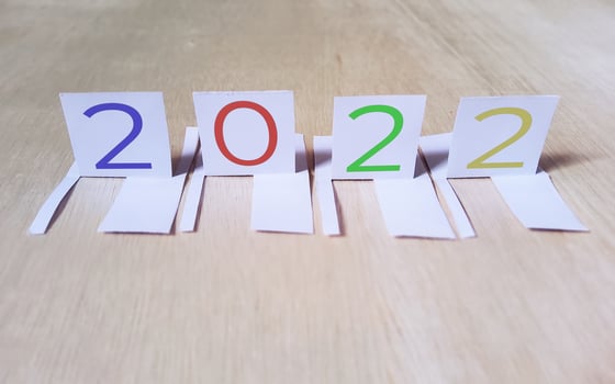 2022 paper cut on wood floor background photo