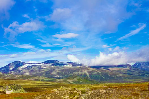 Incredible norwegian landscape colorful mountains clouds forests Jotunheimen Norway photo