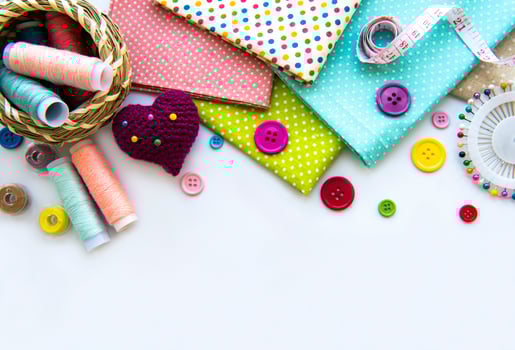 Sewing accessories on a white background photo