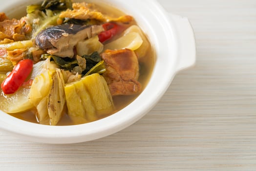 boiled pickled cabbage and bitter gourd soup photo
