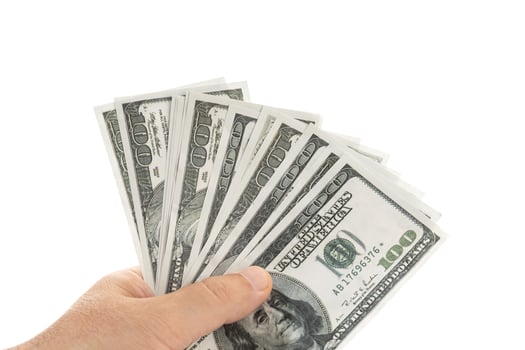 Hand holding money banknotes isolated on white background photo
