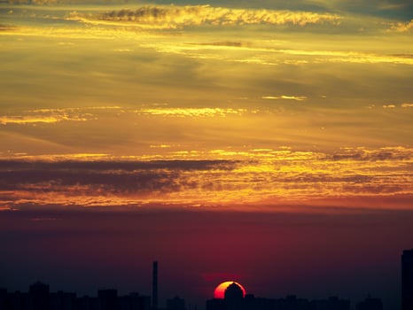 Sun rising over Kyiv city skyline, Ukraine photo