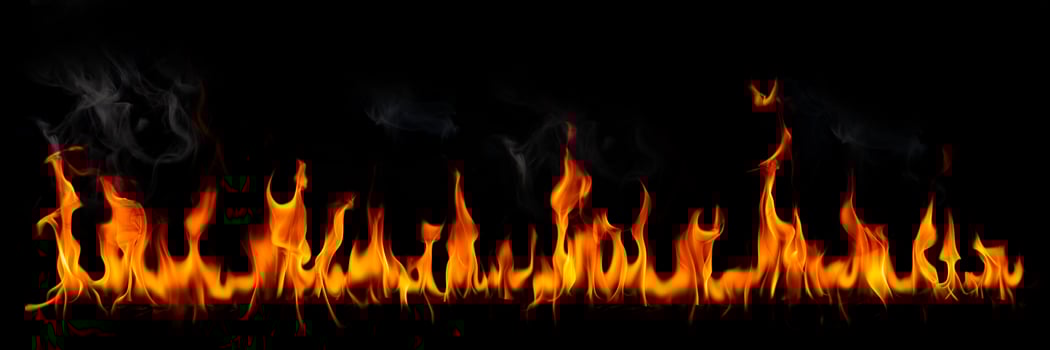 Fire flames on the black background photo