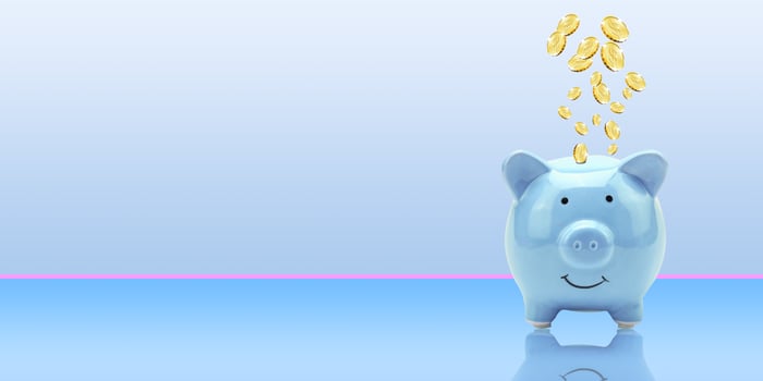 Coins flying and floating to piggy bank for creative financial saving a deposit concept with copy space, Business or finance saving money, Finance and banking advertising coins photo