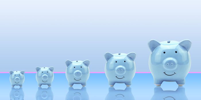 Coins flying and floating to piggy bank for creative financial saving a deposit concept with copy space, Business or finance saving money, Finance and banking advertising coins photo