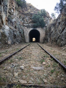 old train tunnel through the mountains photo