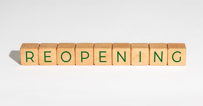 Reopening concept after the coronavirus pandemic. Wooden blocks with text isolated on white background photo