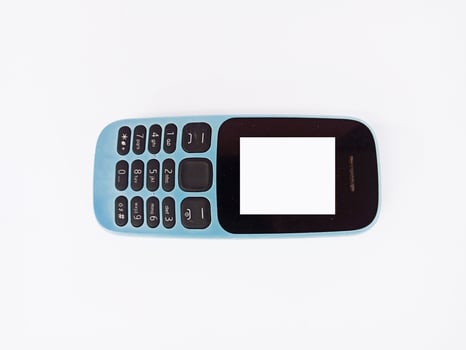 Top view landscape, old hand phone isolated on white background photo