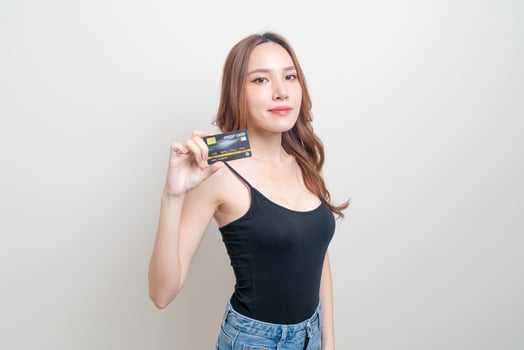 portrait beautiful Asian woman holding credit card photo