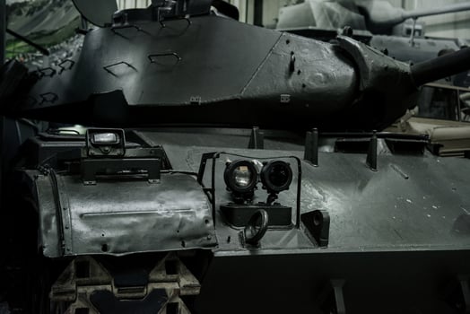 SINSHEIM, GERMANY - OCTOBER 16, 2018 Technik Museum. Headlights and cannon. Powerful old black tank at the exhibition photo