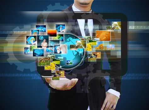 businessman holding Reaching images streaming in hands .Financial and technologies concepts photo
