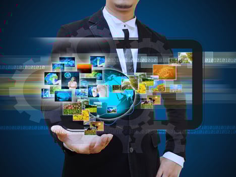 Businessman holding business collection photo