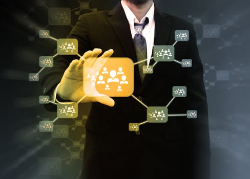Businessman holding icon of social network photo