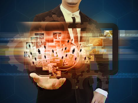 Businessman holding business collection photo