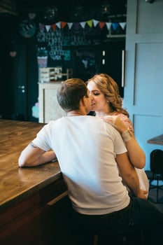 guy and a girl meeting in a city cafe photo