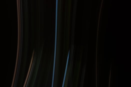 Abstract dark background with vertical multicolored lines. photo