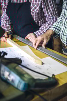 Unrecognizable senior couple in a carpentry photo