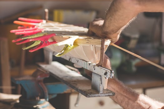 handcrafted craftwork of a wooden boat model photo