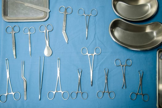 Surgical instruments set on a table in Surgical room photo
