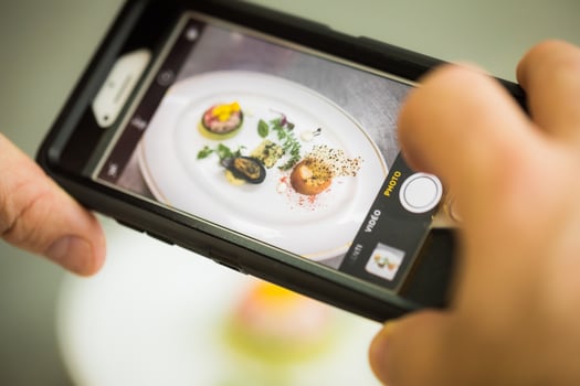 Taking a loseup of See Fiid Plate with a Smarthphone photo