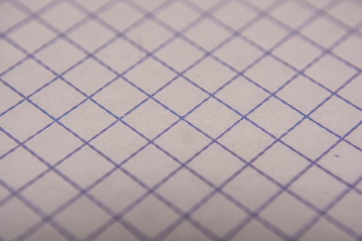 Close-up of notebooks in a cage photo